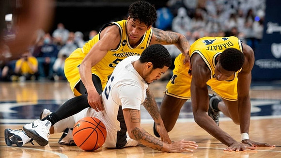 Eli Brooks (55) and Moussa Diabate (14)