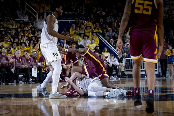 Tarris Reed Jr. (32) and Hunter Dickinson (1)