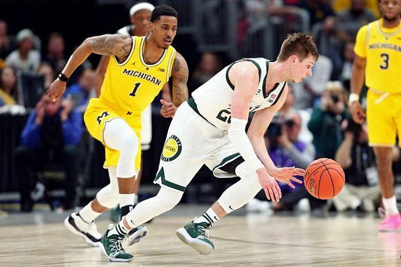 Charles Matthews (1) and Zavier Simpson (3)