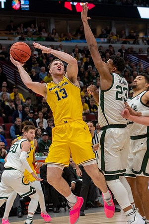 Ignas Brazdeikis (13) and Jordan Poole (2)