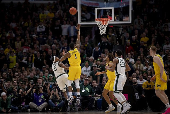 Charles Matthews (1), Isaiah Livers (4), and Ignas Brazdeikis (13)