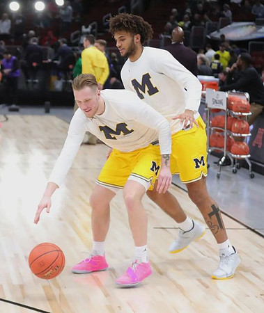 Ignas Brazdeikis (13) and Isaiah Livers (4)