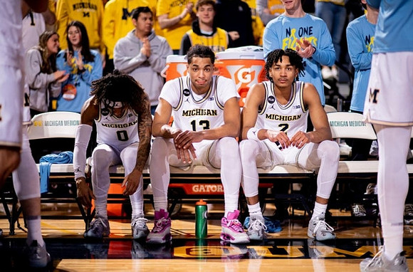 Dug McDaniel (0), Jett Howard (13), and Kobe Bufkin (2)