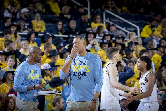 Jim Harbaugh, Joey Baker (15), and Kobe Bufkin (2)
