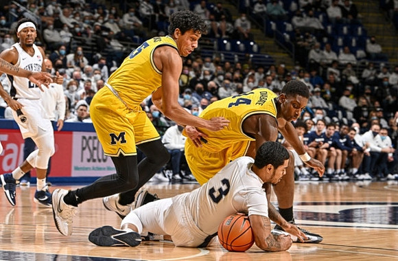 Eli Brooks (55) and Moussa Diabate (14)