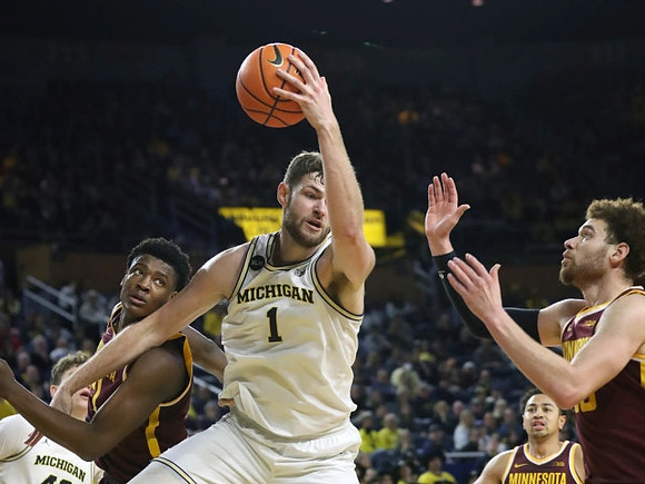 Will Tschetter (42) and Hunter Dickinson (1)
