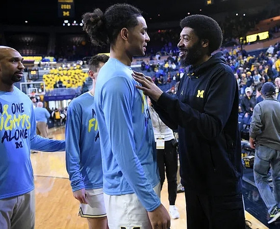 Saddi Washington, Jett Howard (13), and Jimmy King