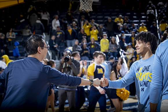 Michigan President Santa Ono  and Jaelin Llewellyn (3)