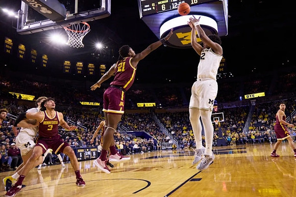 Will Tschetter (42) and Tarris Reed Jr. (32)