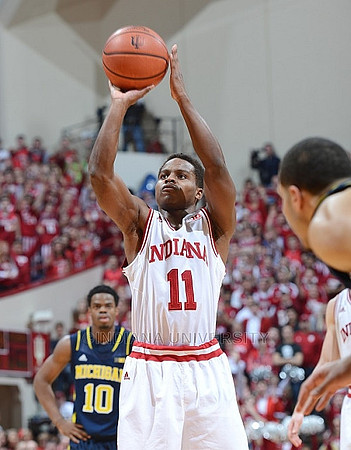 Jordan Morgan (52) and Nik Stauskas (11)