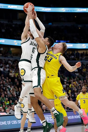 Ignas Brazdeikis (13) and Zavier Simpson (3)
