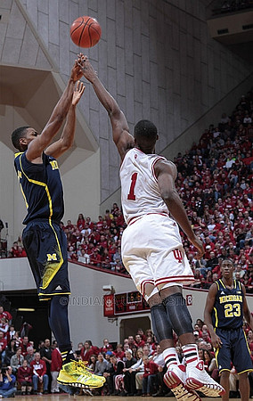 Nik Stauskas (11) and Caris LeVert (23)
