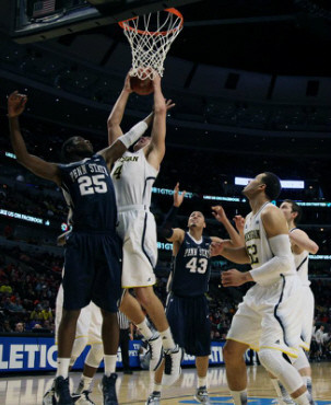 Mitch McGary (4), Jordan Morgan (52), and Nik Stauskas (11)