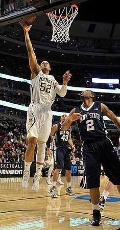 Caris LeVert (23), Jon Horford (15), Glenn Robinson III (1), and Trey Burke (3)