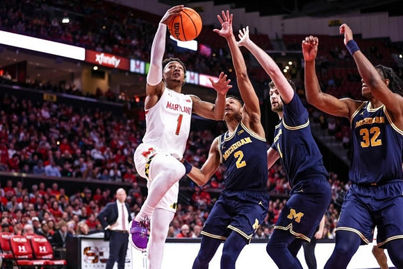 Maryland Head Coach Kevin Willard, Kobe Bufkin (2), Hunter Dickinson (1), and Tarris Reed Jr. (32)