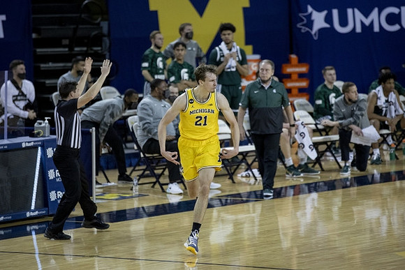 Franz Wagner (21) and Michigan State Head Coach Tom Izzo
