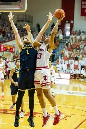 Hunter Dickinson (1) and Eli Brooks (55)