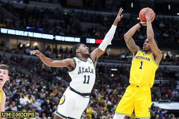 Charles Matthews (1) and Jon Teske (15)