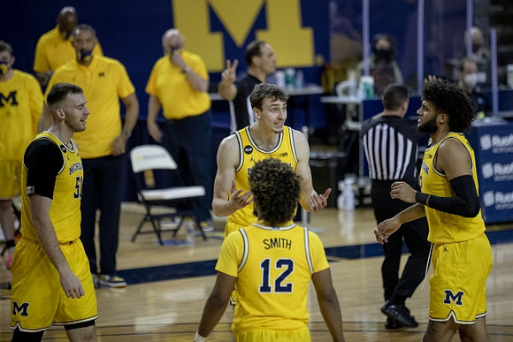 Austin Davis (51), Mike Smith (12), Franz Wagner (21), Isaiah Livers (2), and Adrien Nunez (0)