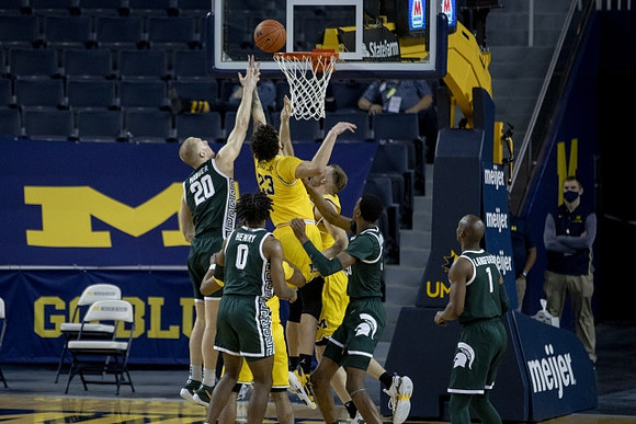 Brandon Johns Jr. (23) and Austin Davis (51)
