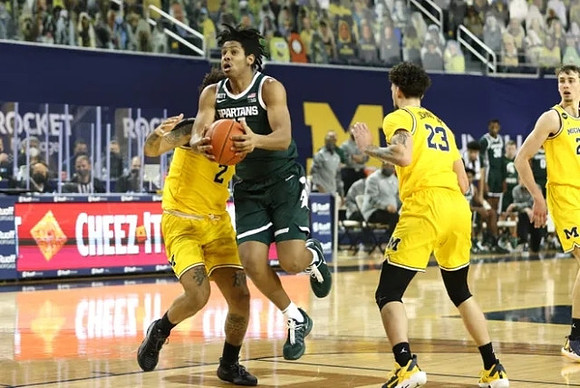Isaiah Livers (2), Brandon Johns Jr. (23), and Franz Wagner (21)