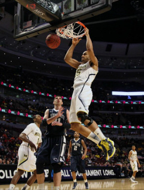 Glenn Robinson III (1) and Jon Horford (15)