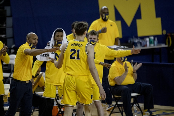 Franz Wagner (21) and Michigan Team