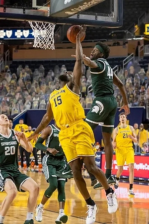 Chaundee Brown Jr. (15) and Franz Wagner (21)