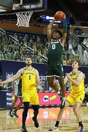 Hunter Dickinson (1) and Franz Wagner (21)