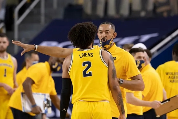 Isaiah Livers (2) and Juwan Howard