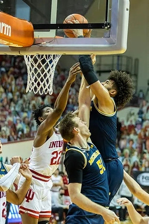 Austin Davis (51) and Isaiah Livers (2)