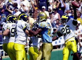 Julius Curry (26), Eric Wilson (94), and Dan Rumishek (92)