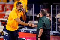 Juwan Howard and Michigan State Head Coach Tom Izzo