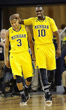 Trey Burke (3) and Tim Hardaway Jr. (10)