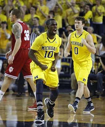 Tim Hardaway Jr. (10) and Zack Novak (0)