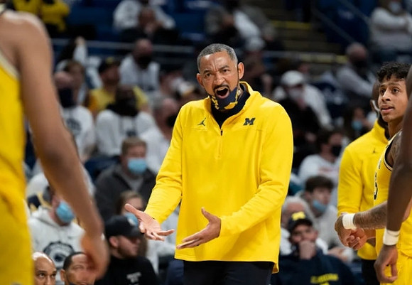 Juwan Howard and Eli Brooks (55)