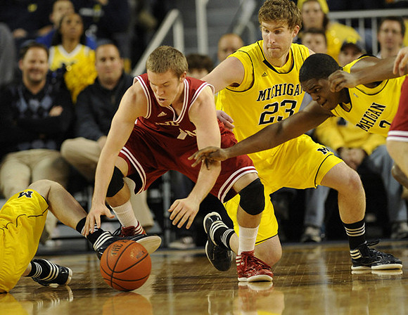 Evan Smotrycz (23) and Carlton Brundidge (2)