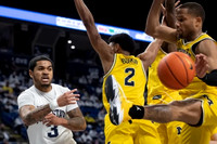 Kobe Bufkin (2) and DeVante' Jones (12)