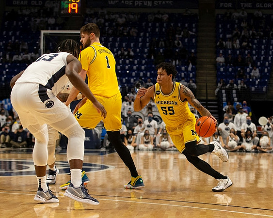 Hunter Dickinson (1) and Eli Brooks (55)