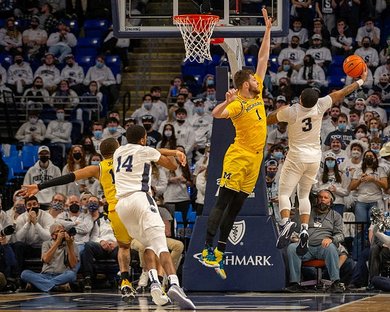 DeVante' Jones (12) and Hunter Dickinson (1)