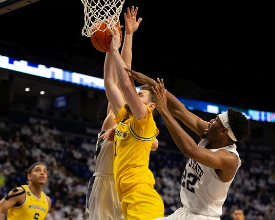 Terrance Williams II (5) and Hunter Dickinson (1)