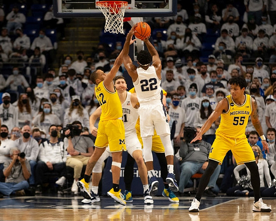 DeVante' Jones (12) and Eli Brooks (55)