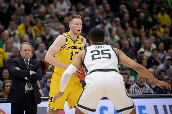 Michigan State Head Coach Tom Izzo and Ignas Brazdeikis (13)