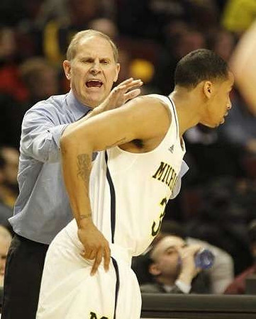 Glenn Robinson III (1) and Jon Horford (15)