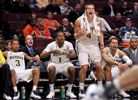 Nik Stauskas (11) and Mitch McGary (4)