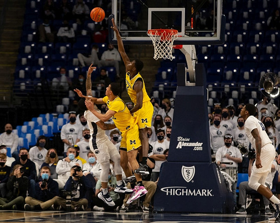 Caleb Houstan (22) and Moussa Diabate (14)