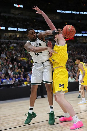 Jon Teske (15) and Eli Brooks (55)