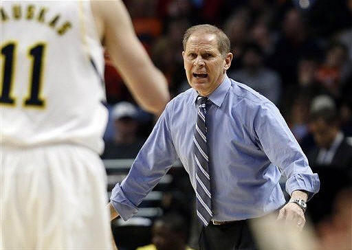 Nik Stauskas (11) and John Beilein