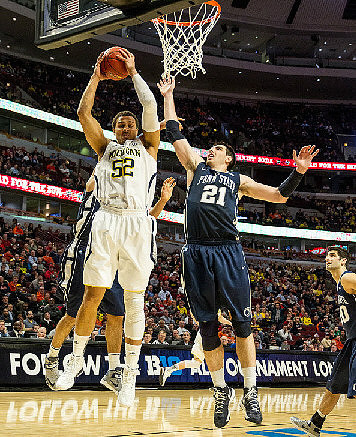 Trey Burke (3) and Nik Stauskas (11)
