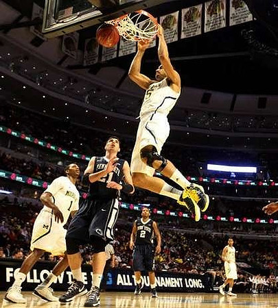Caris LeVert (23) and Glenn Robinson III (1)
